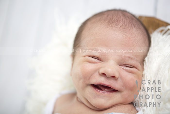 smile newborn photo