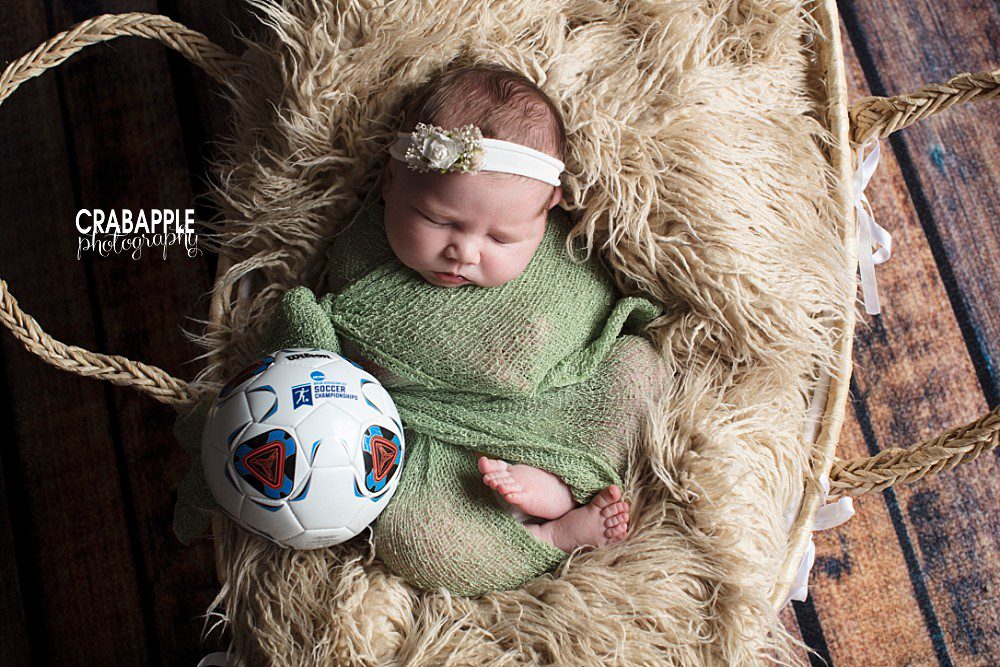 newborn portraits with soccer ball