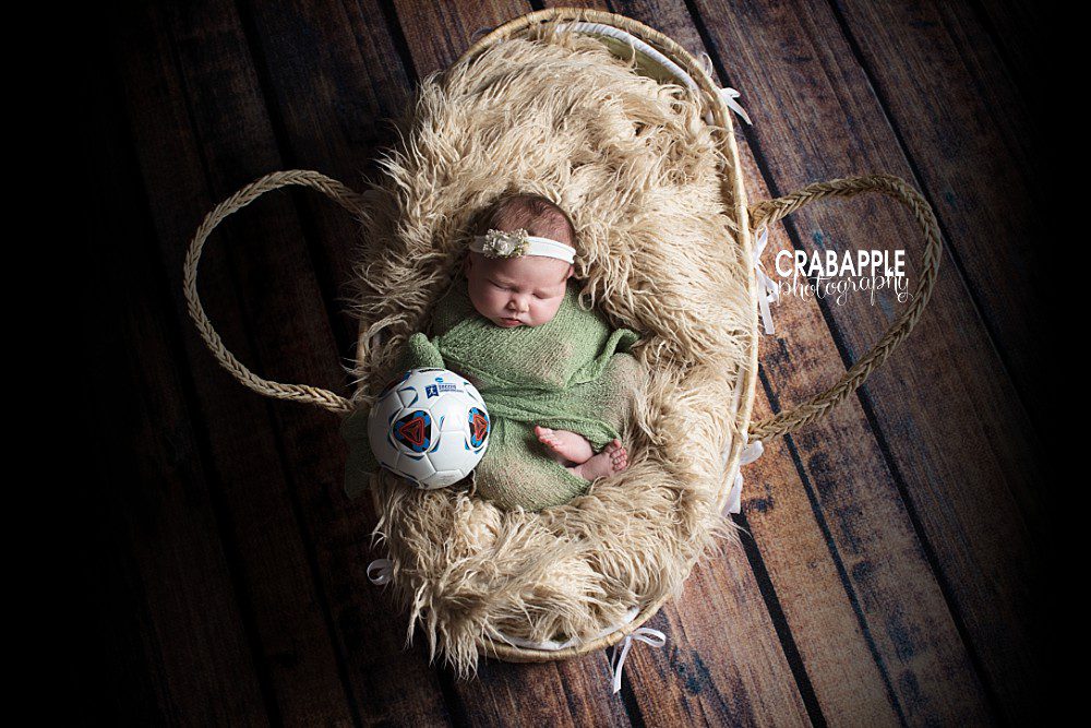 newborn photos with soccer ball