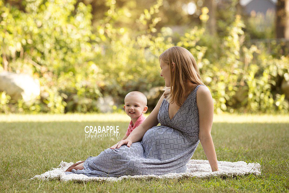 outdoor maternity photos with sibling ma