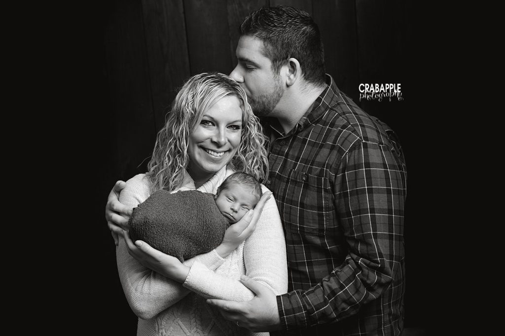 black and white family portraits with newborn