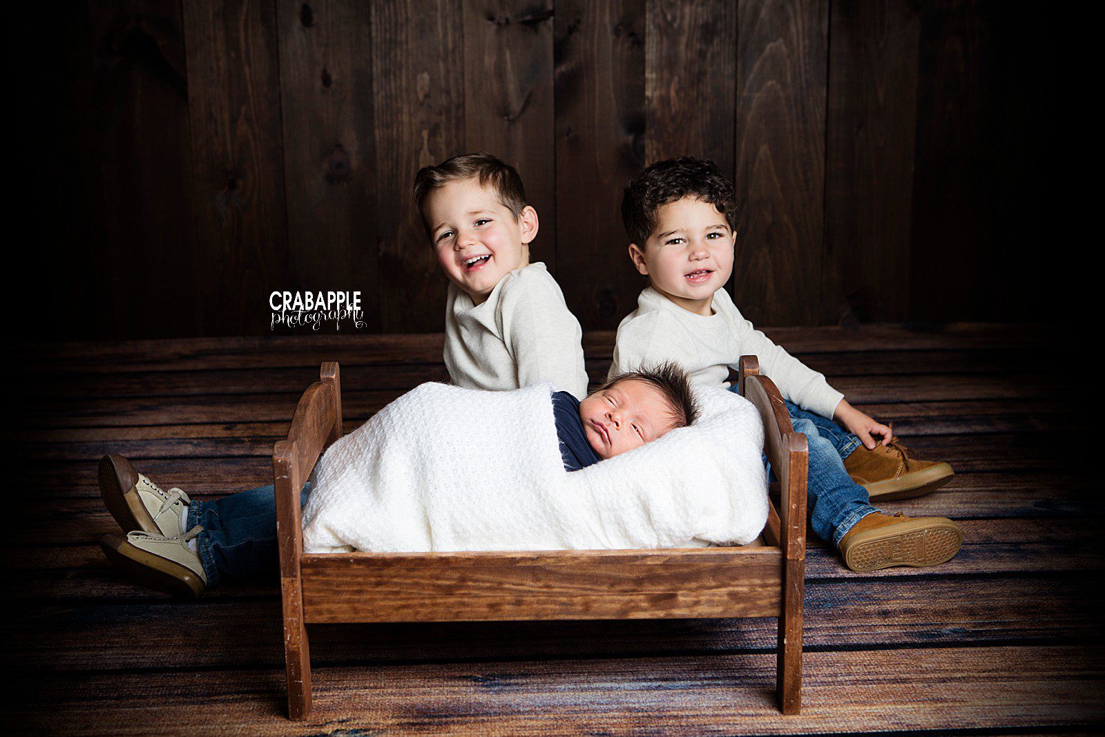 toddler brothers with newborn pictures
