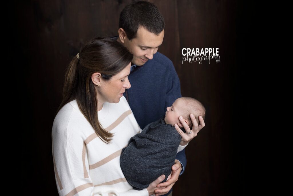 family photo of parents with 3 month old baby