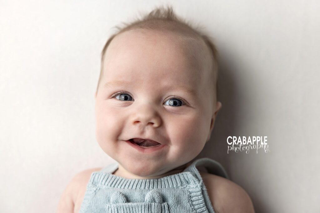 3 month baby smiling during studio session in Boston MA
