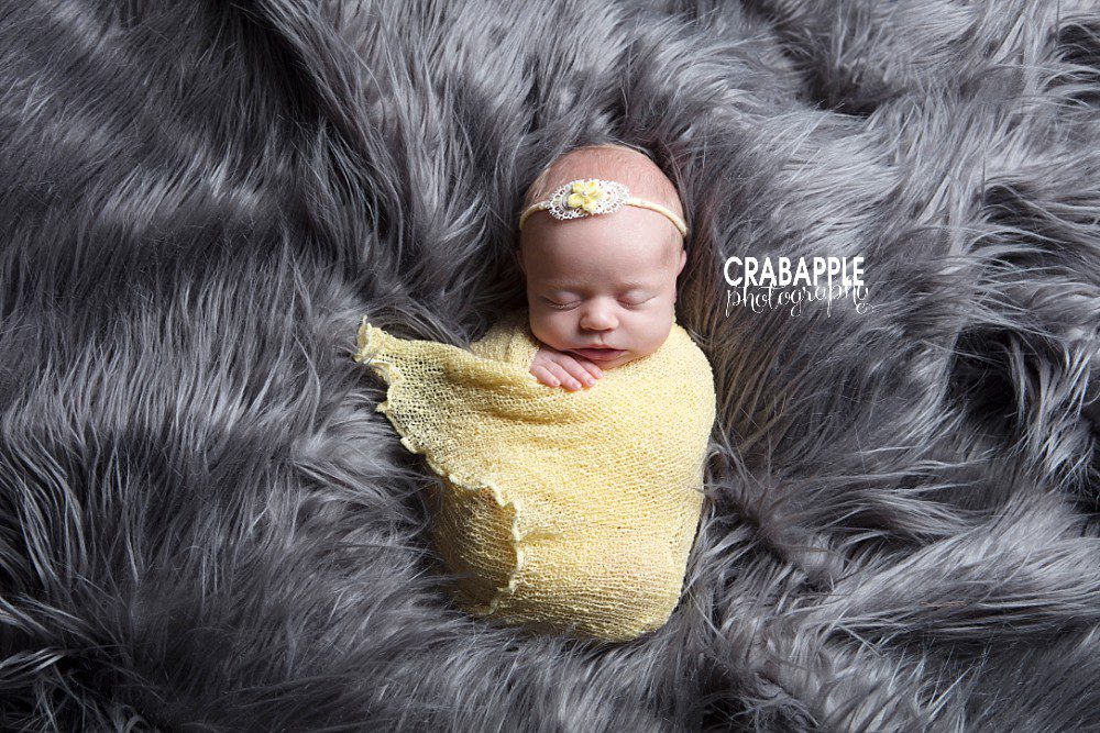 newborn baby girl photos using yellow and gray