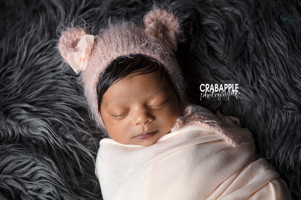 pink and gray baby portraits