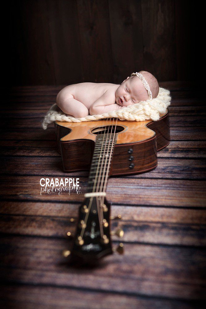 newborn portraits using guitar