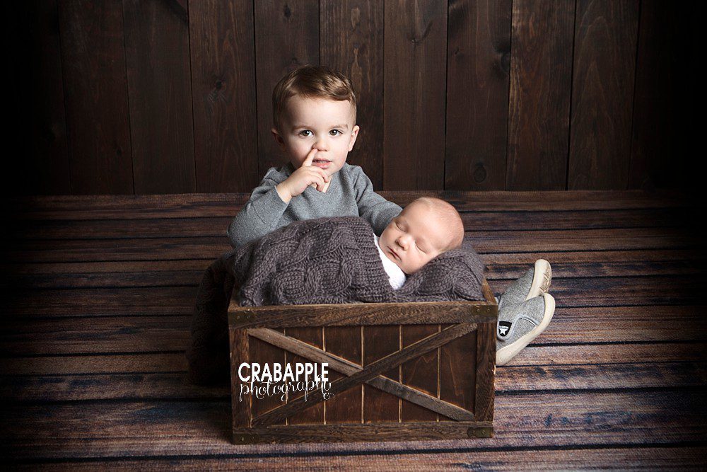 newborn pictures with big brother funny