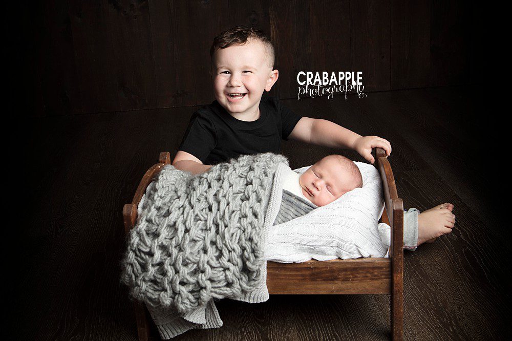 brother photos with new baby