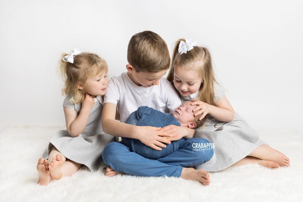 Newborn Photos with 3 older siblings
