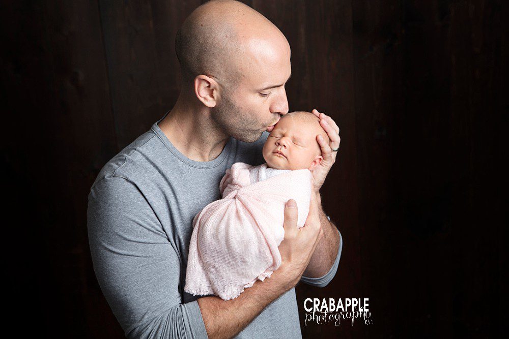 father and newborn daughter photo ideas