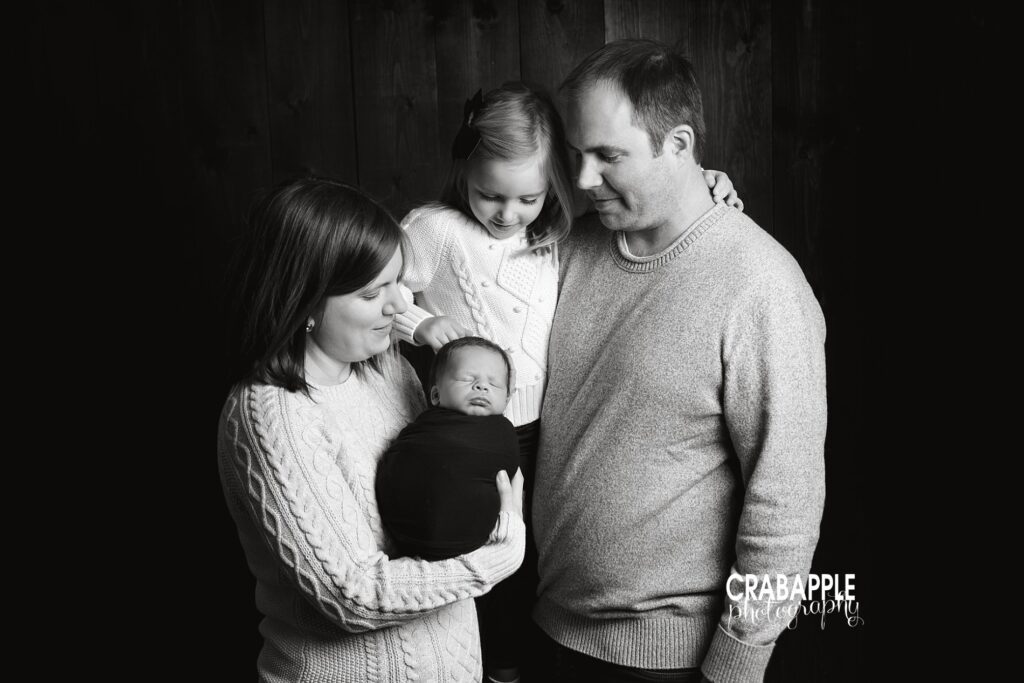 black and white family photos with newborn