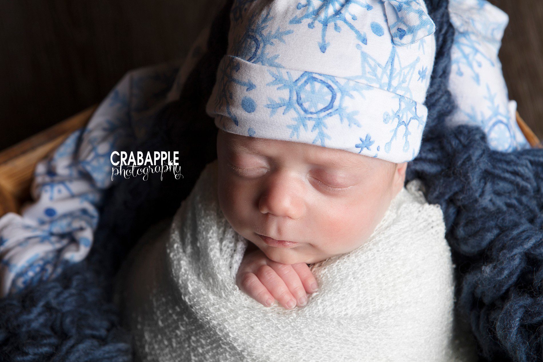 Close up detail shot of newborn showing hands and face details