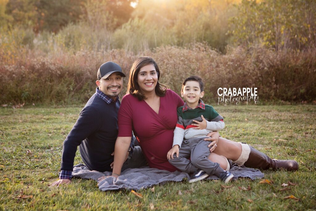 outdoor fall maternity photos with the whole family