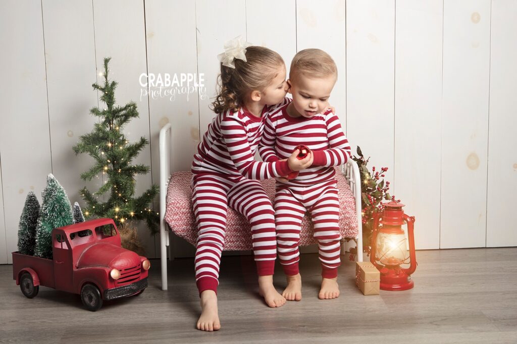 sibling holiday photos matching pajamas