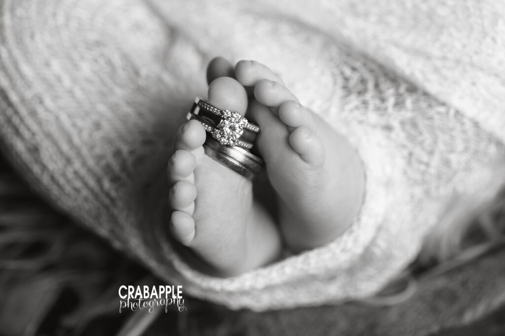 newborn pictures with wedding rings