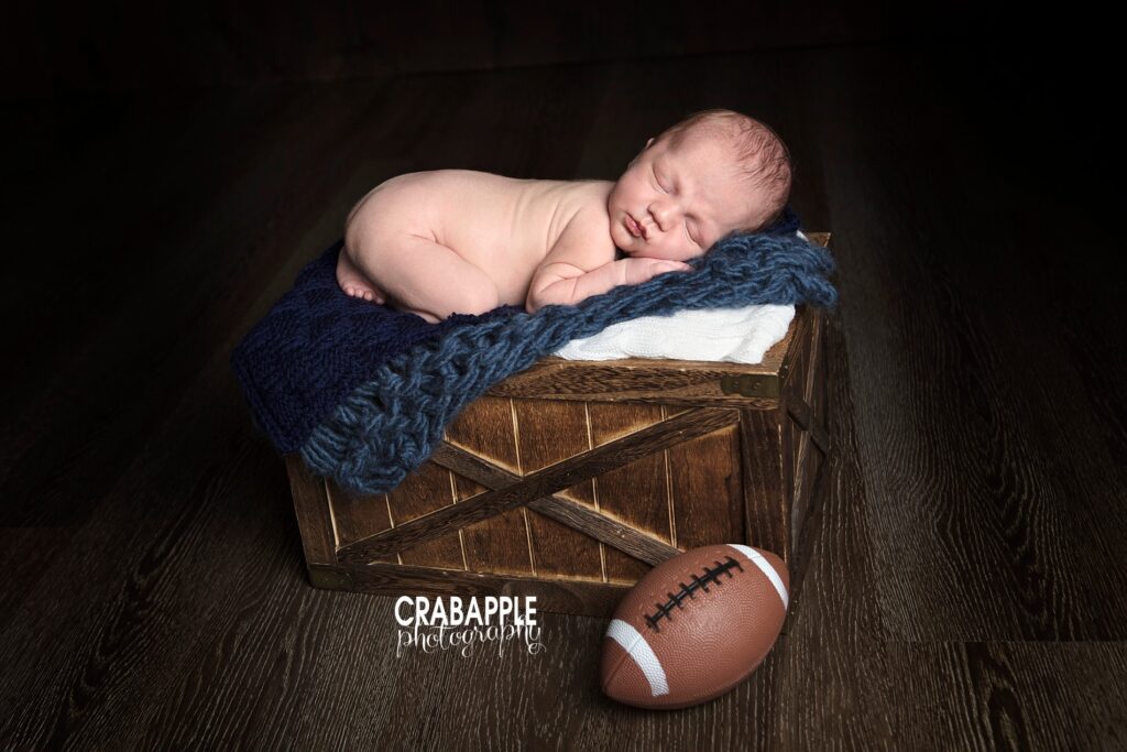newborn pics with football