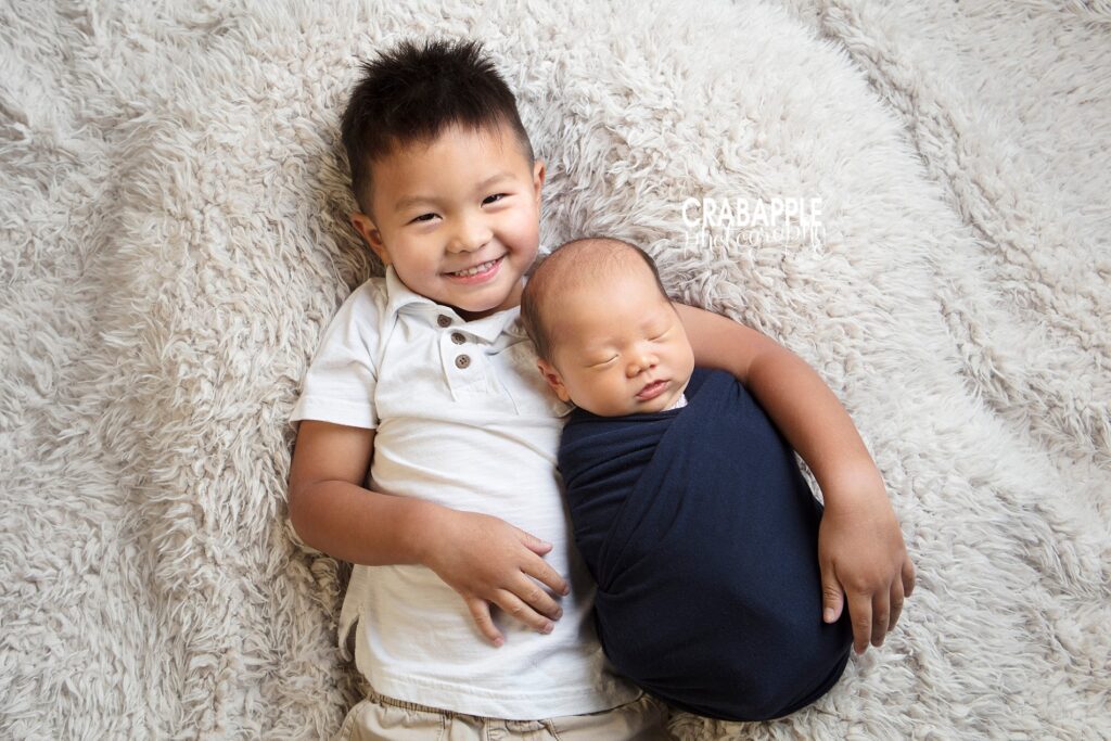 newborn photos with brother