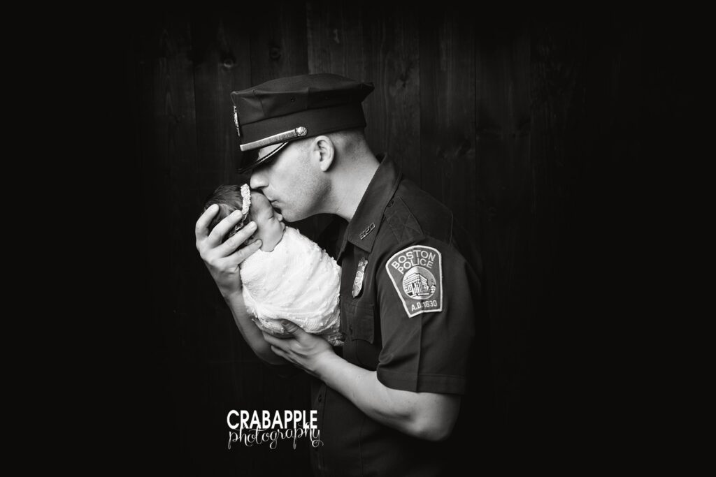 newborn portraits with police officer father in uniform