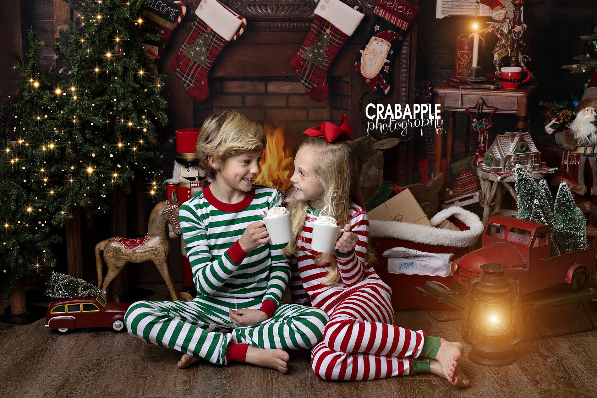 christmas portraits for siblings in matching pajamas