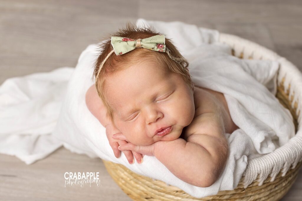 Soft, heartfelt image of sleeping baby girl Tender newborn photo capturing peaceful expression in newborn portraits after child loss