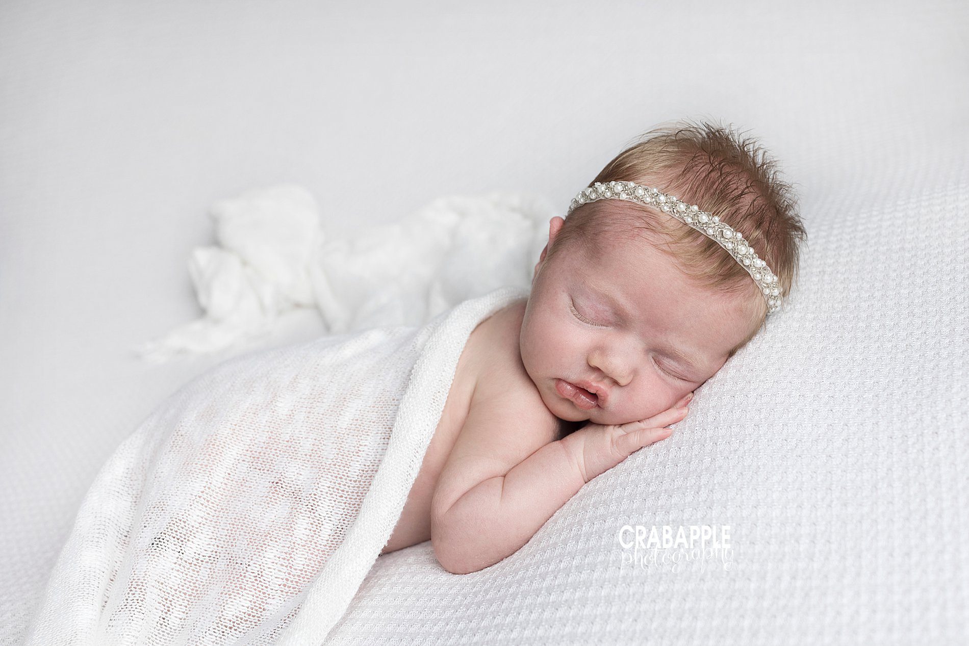 Clean and simple newborn photo ideas using white