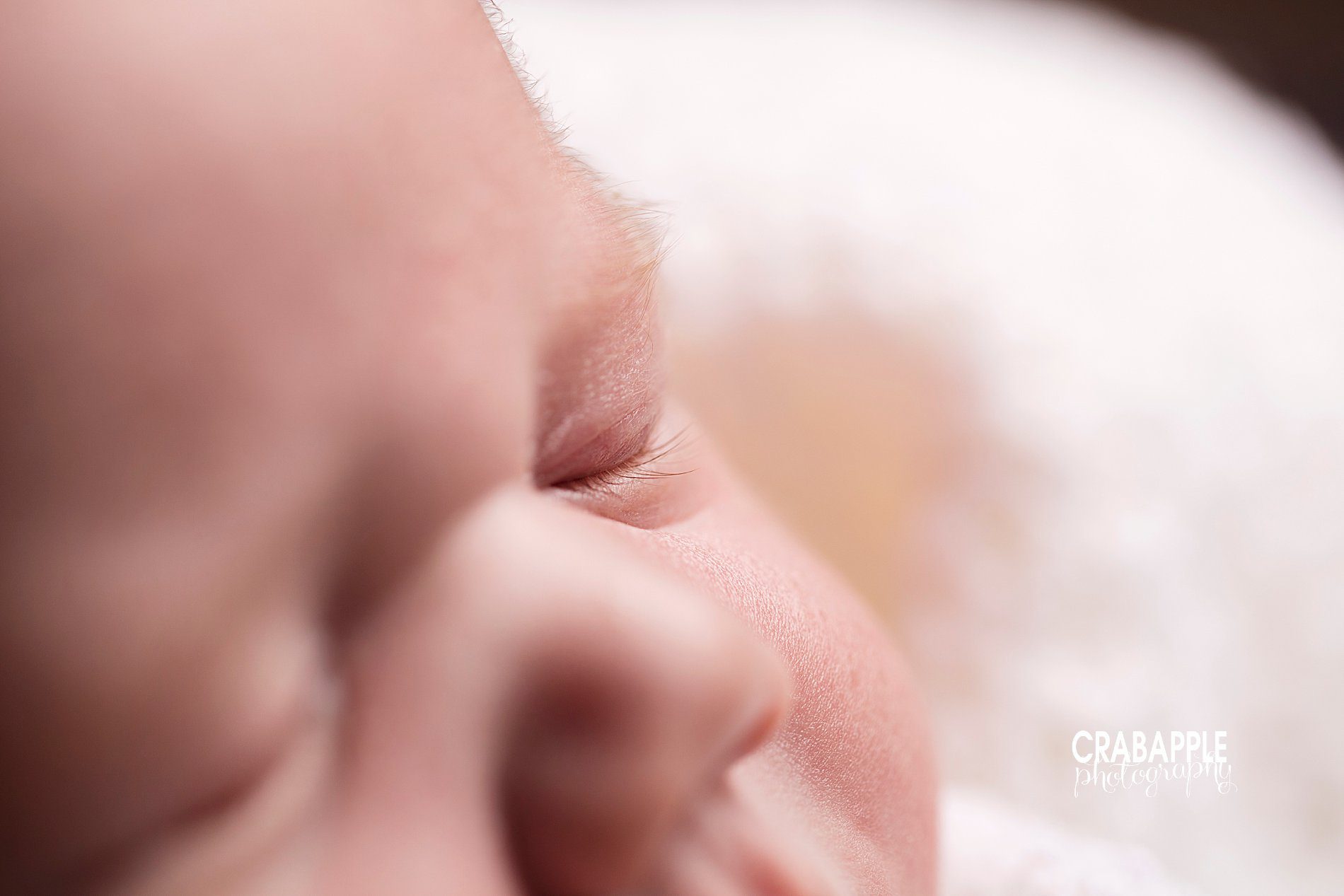 Close up portraits of newborn eyelashes