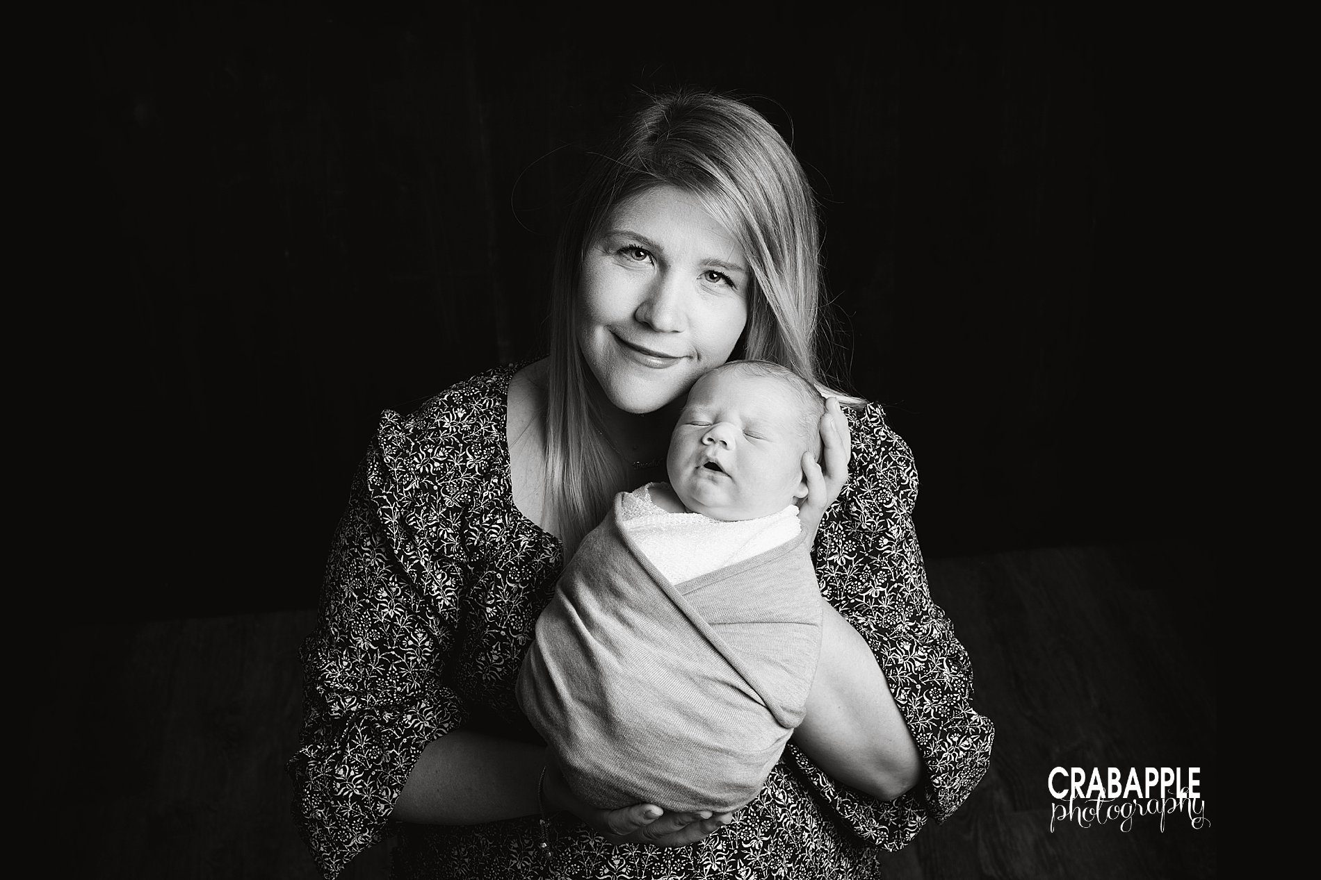 Black and white mother and son newborn portrait