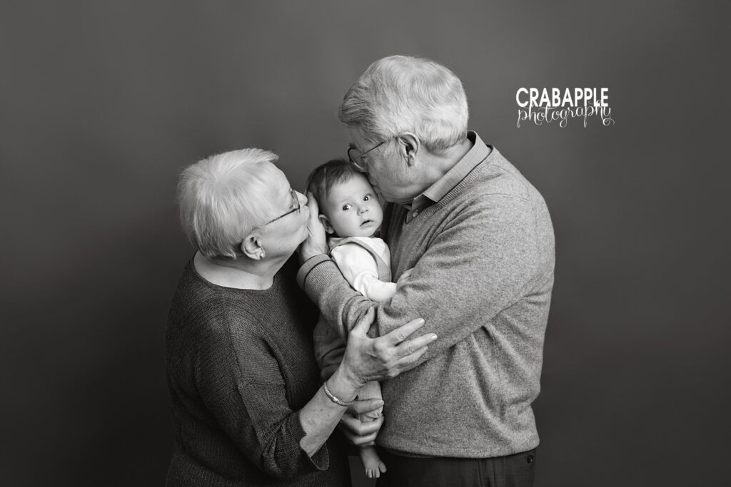 Black and white family portraits of grandparents and baby.