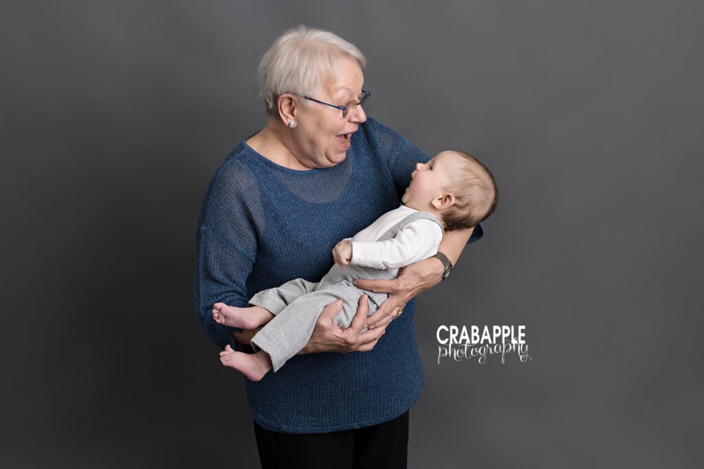 Fun portrait ideas of baby and grandmother looking at each other.