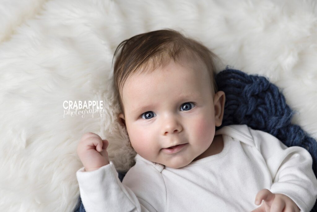 Timeless baby portrait photography using neutrals and whites.
