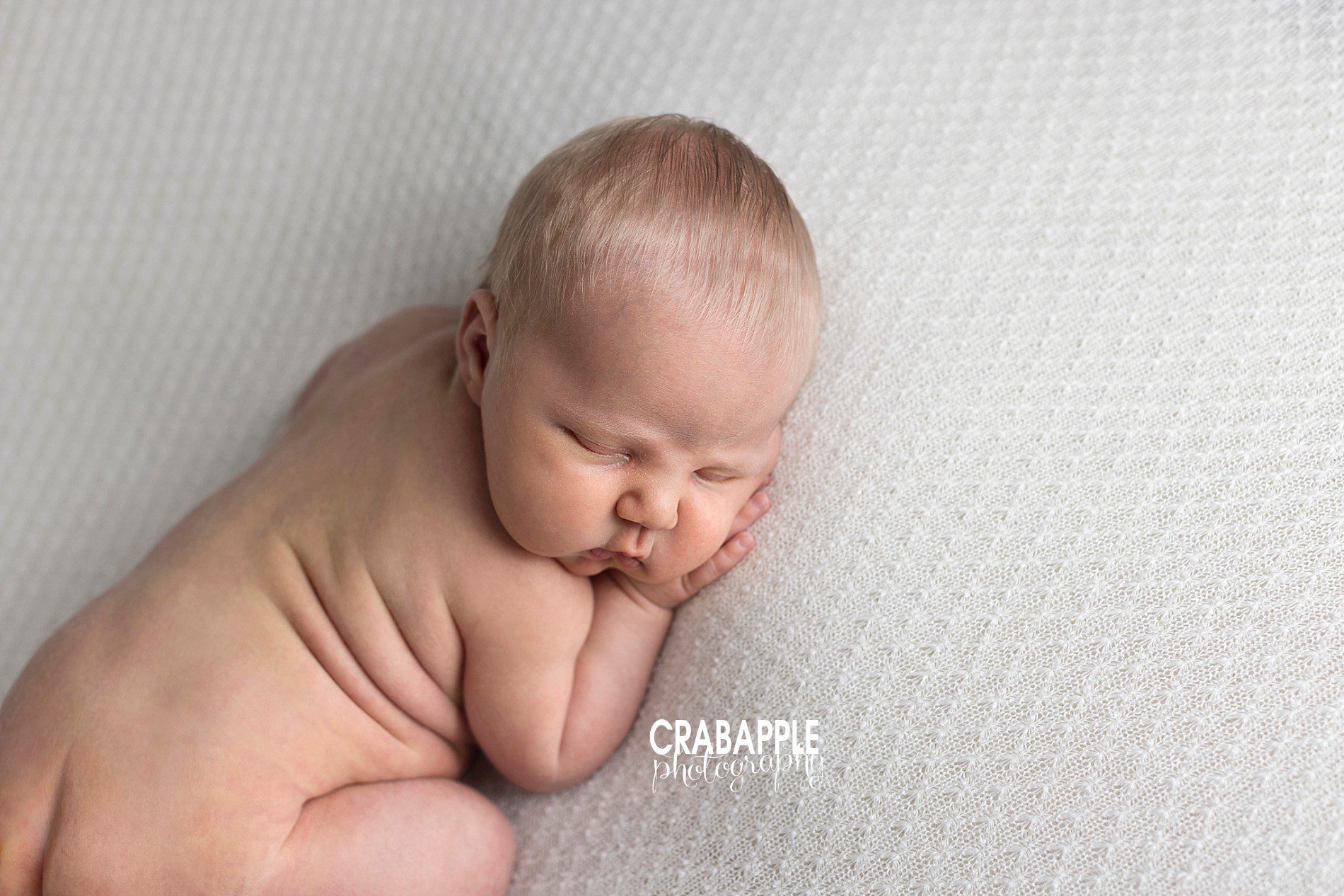 Clean and simple newborn portrait photography.