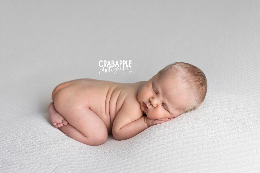 Clean and simple newborn portrait photography inspiration.