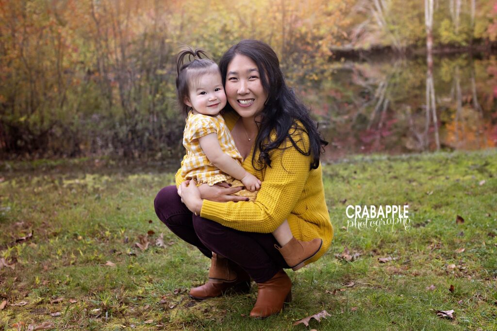 Posing and styling inspiration for mother daughter toddler photos outside in fall using yellow.