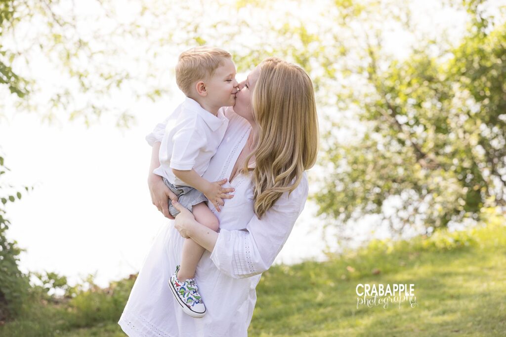 sweet family portrait poses with mother and son