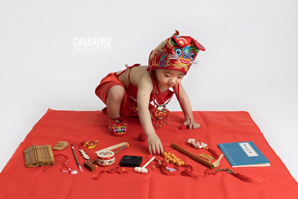 chinese first birthday tradition photos with traditional clothing