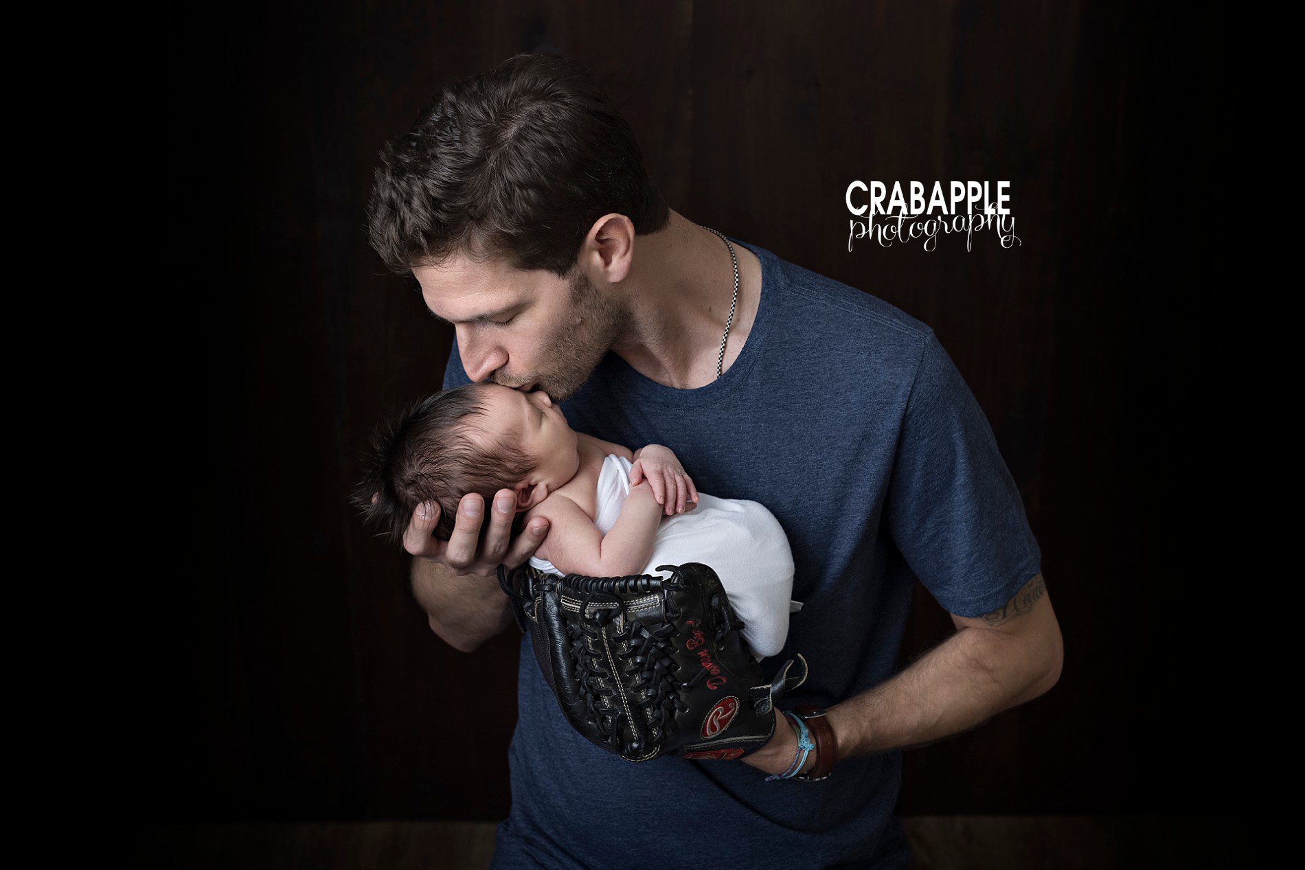 Newborn photo ideas and poses with baseball glove