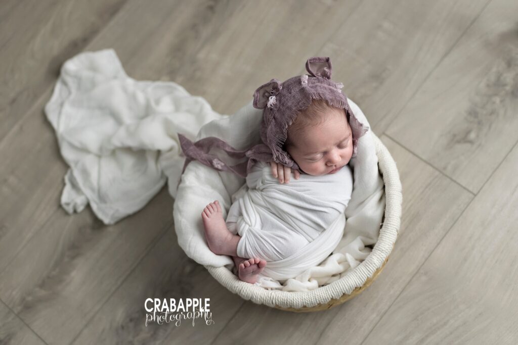 Posing and styling ideas for newborn photos using props and accessories.