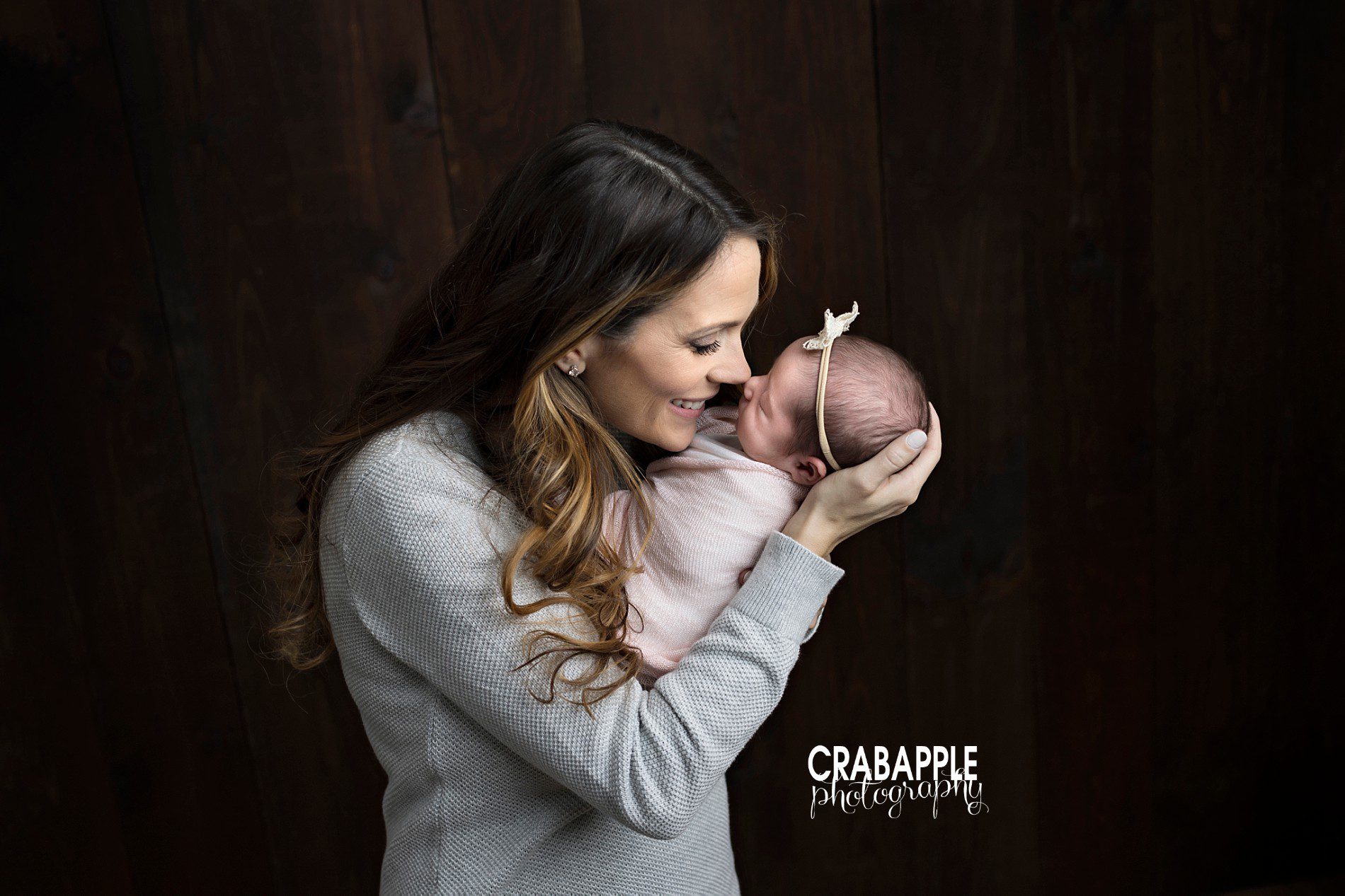How to pose mom and her newborn baby during photos