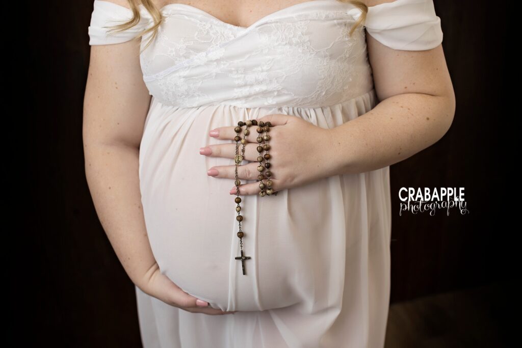 pregnancy portraits with rosary beads