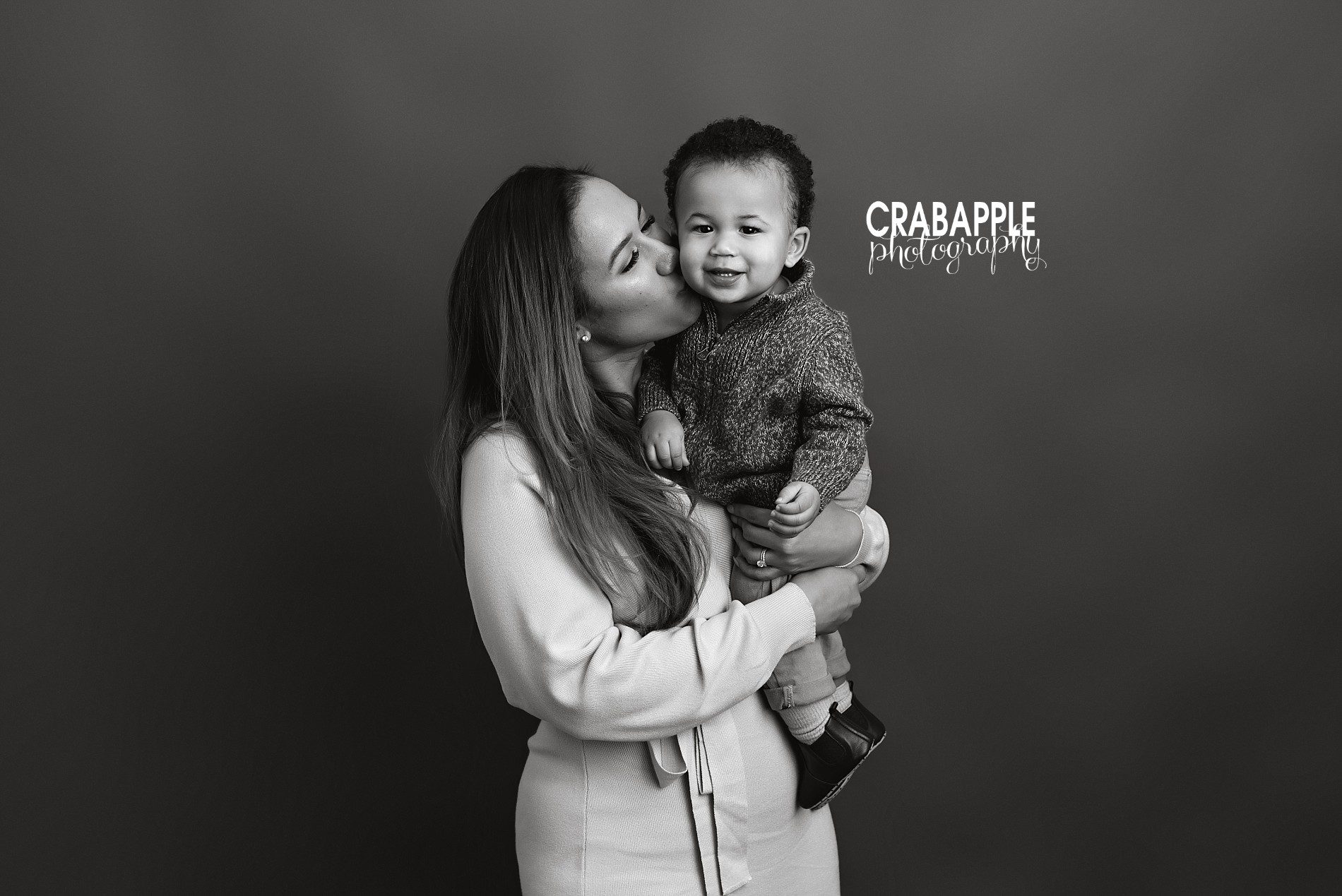 Mother and son posing ideas for portraits with baby boy