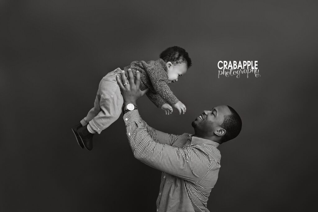 Fun and creative poses for father and son portraits with baby