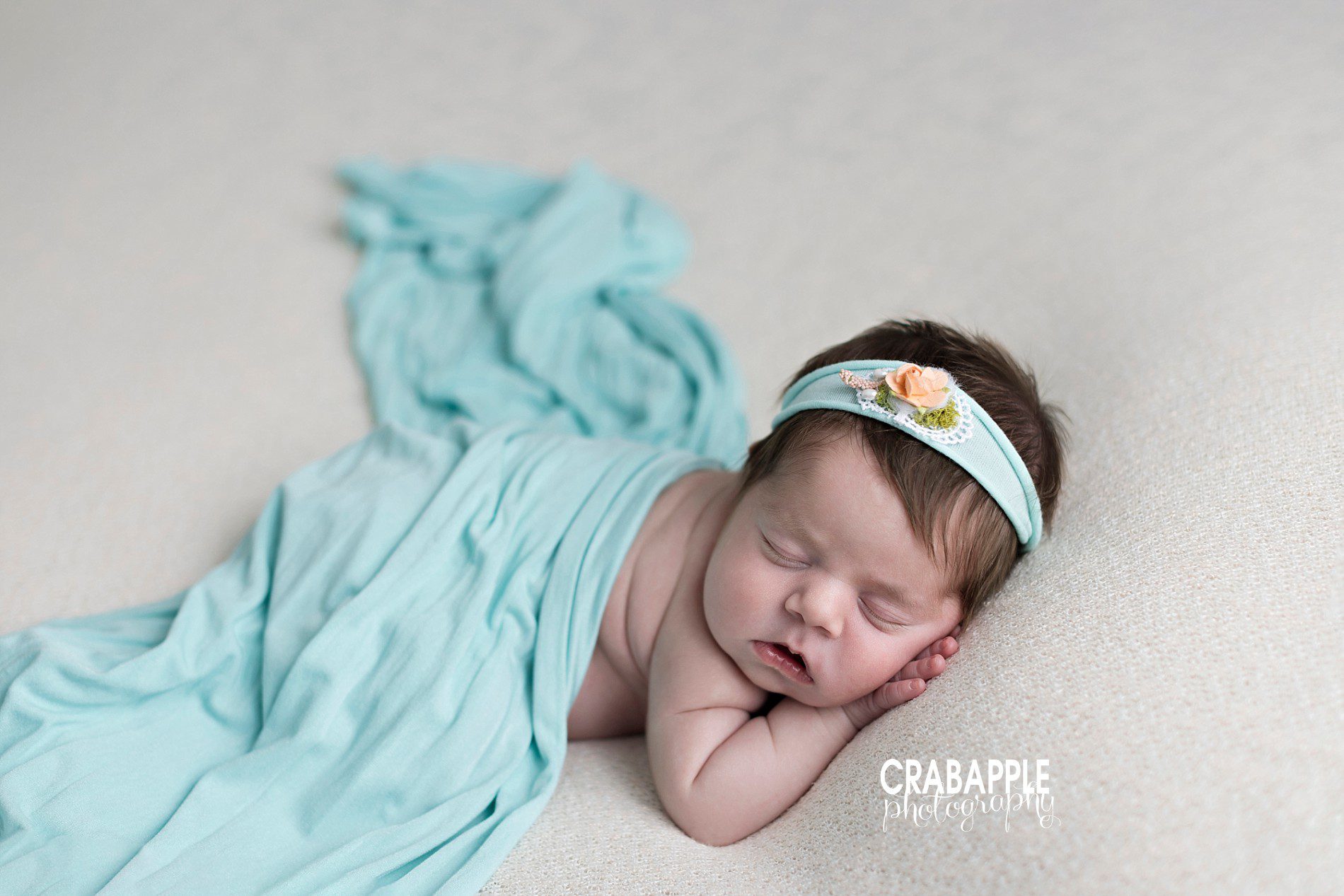 baby girl newborn photos with teal blue aqua bright colors