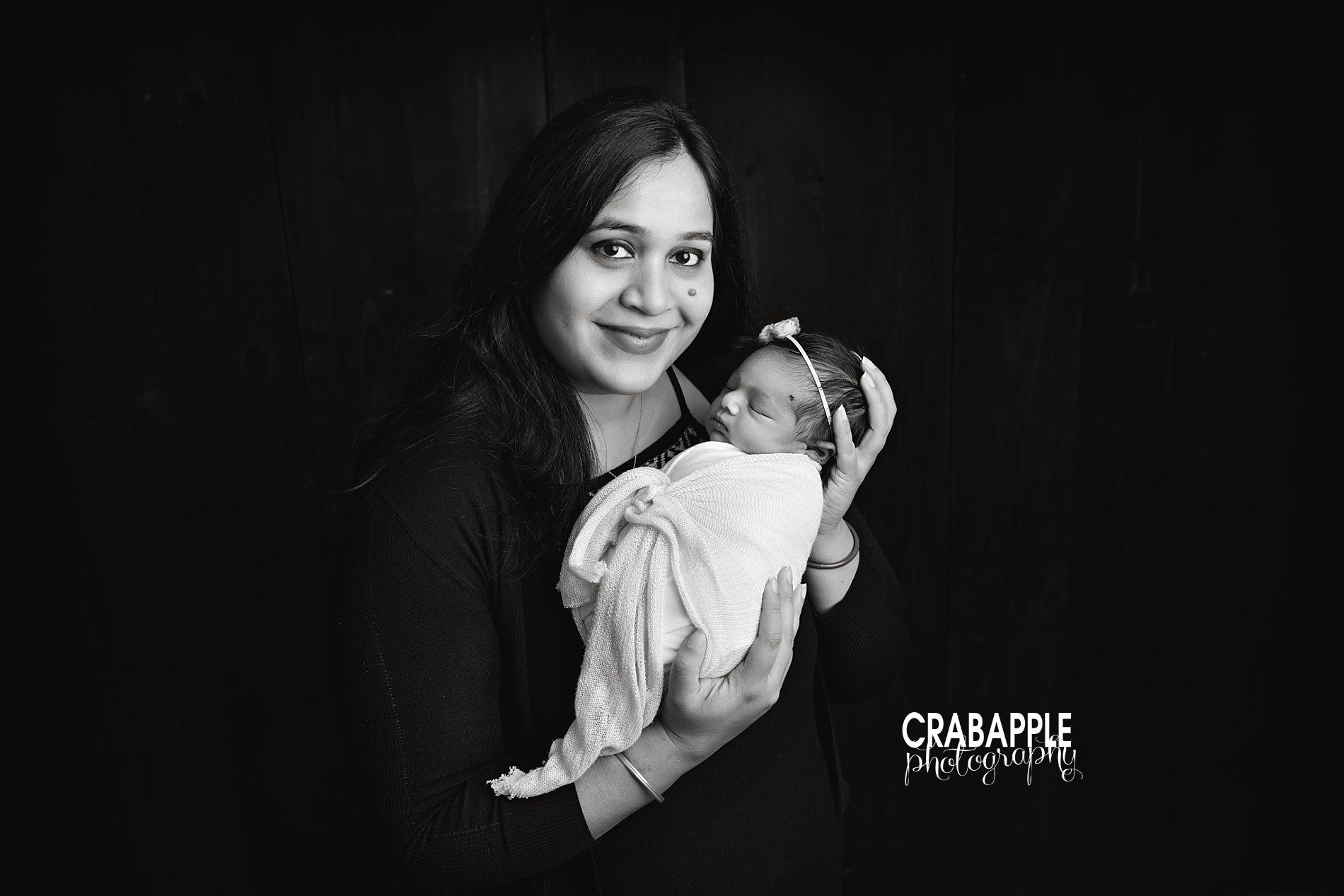 black and white portrait of mom and newborn baby girl
