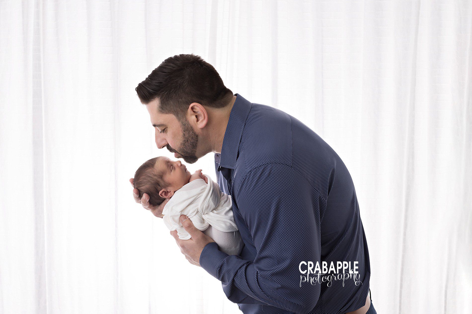 bright airy father and son newborn pictures