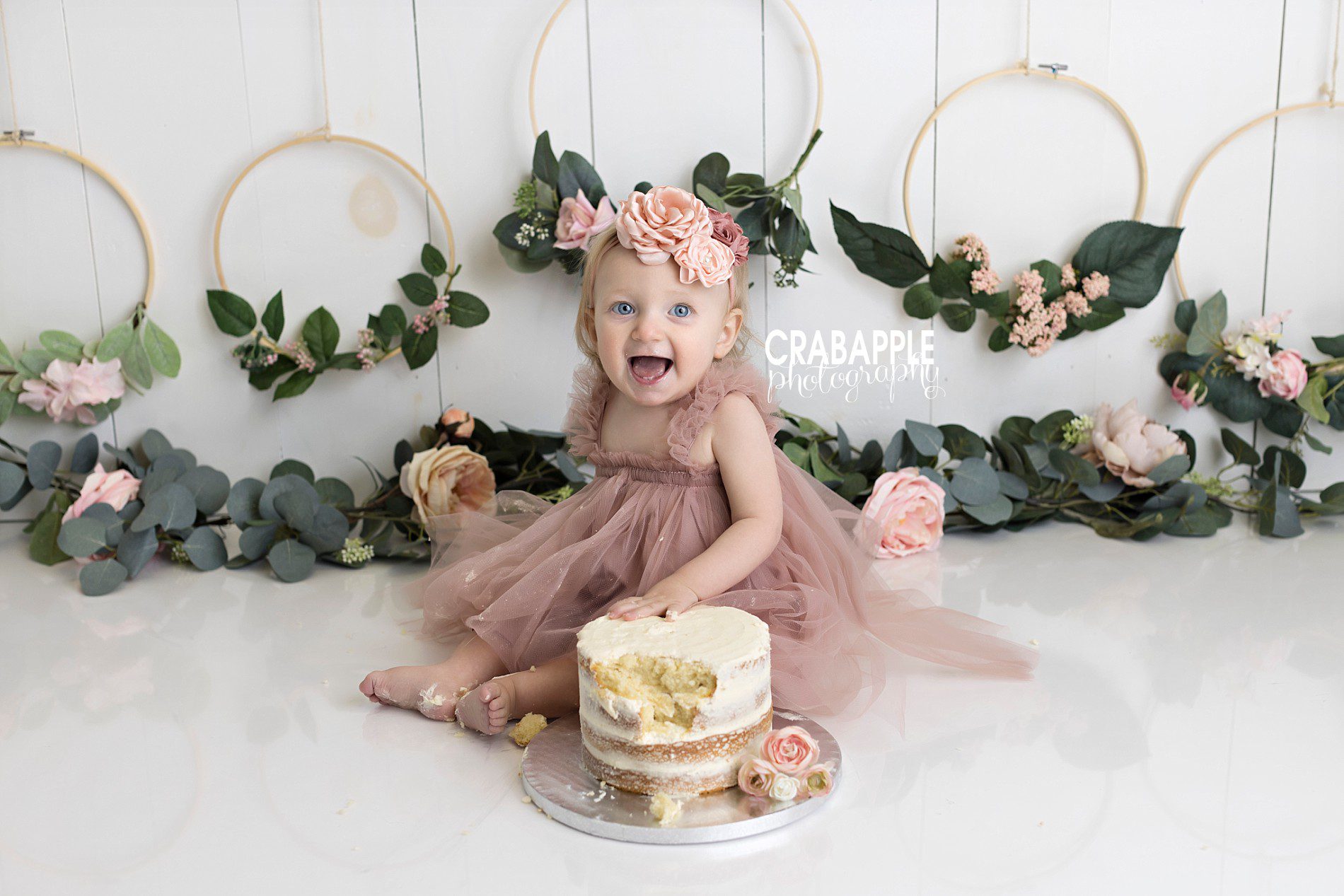 first birthday photos with flower hoops