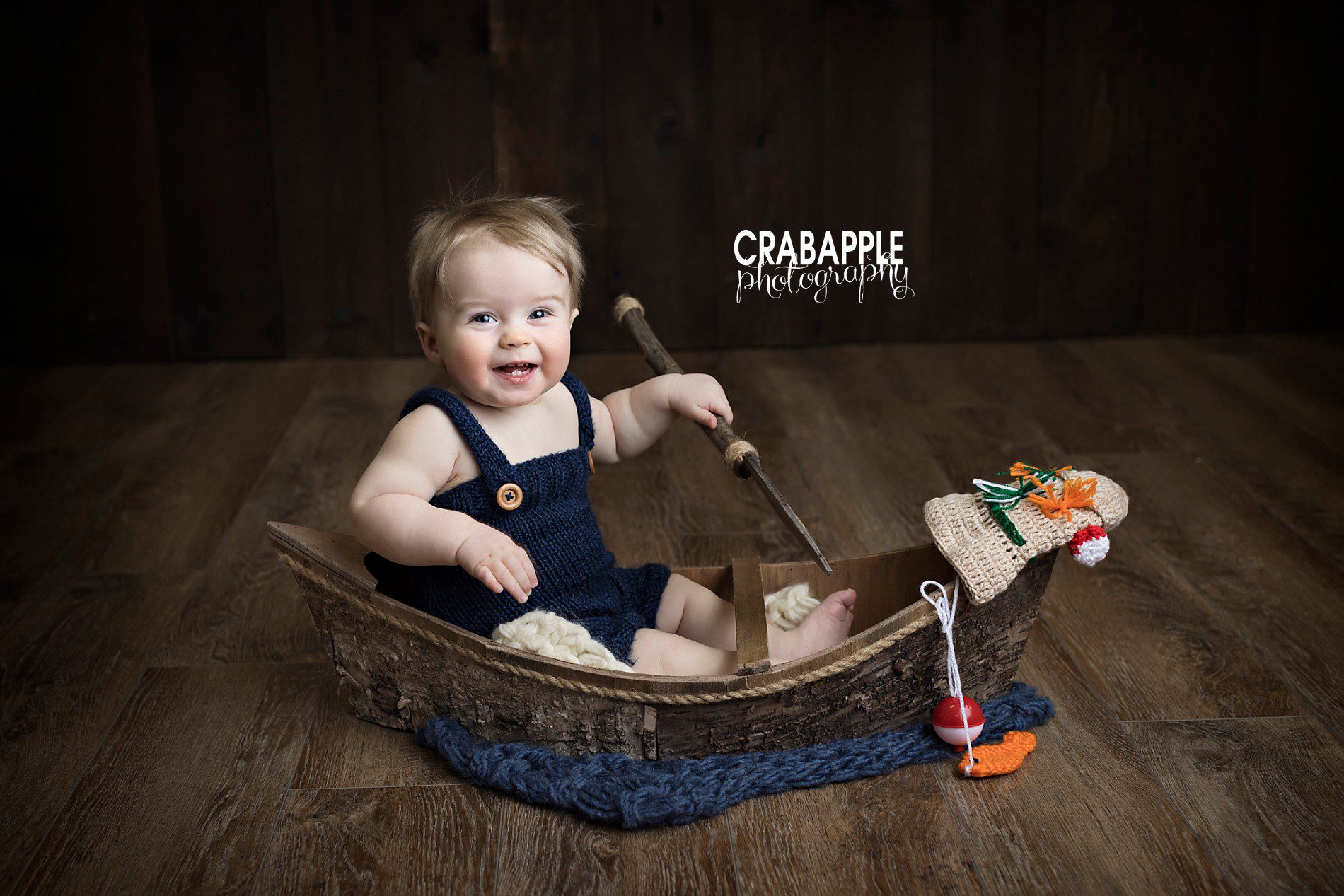 fun fishing themed photos for 9 month old baby sitter session ipswich ma photographer