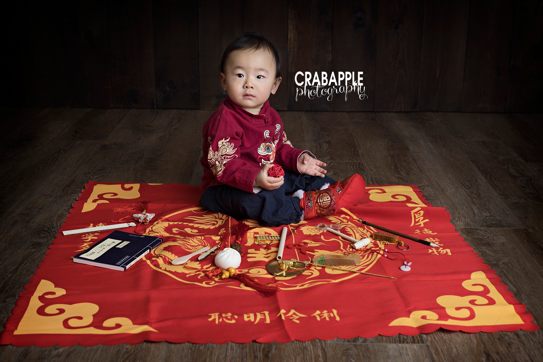 chinese first birthday tradition ritual choosing object for future profession
