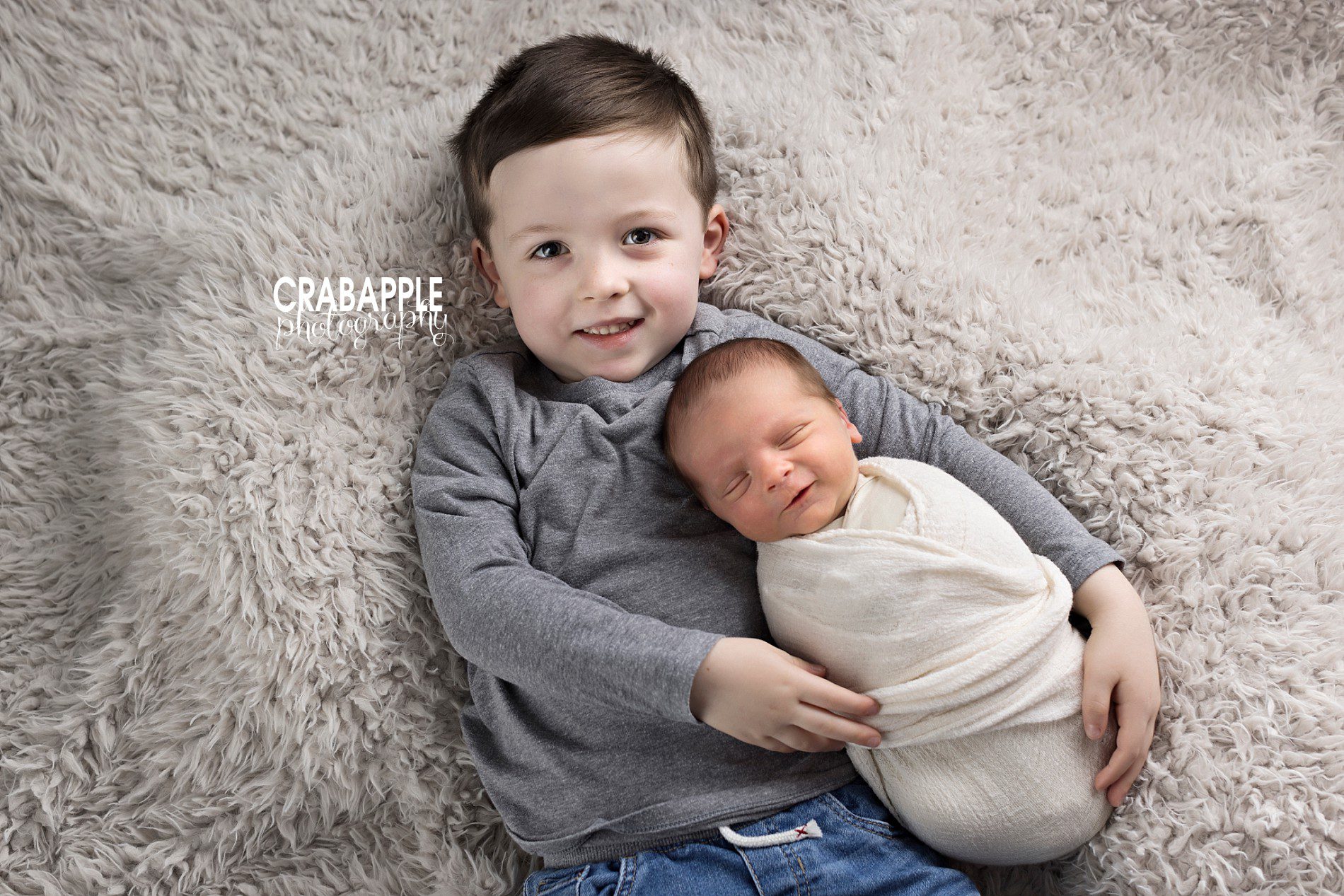 sibling photos with newborn baby brother