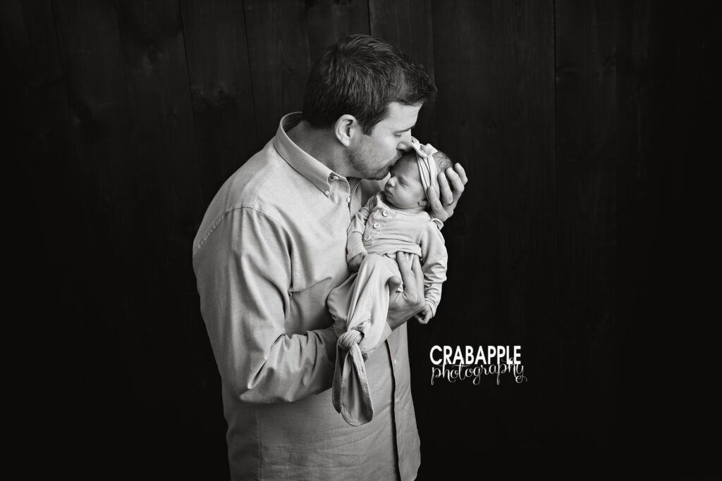 black and white newborn portraits with dad